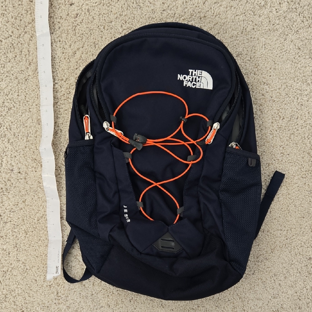 The North Face Backpack in Navy and Orange
